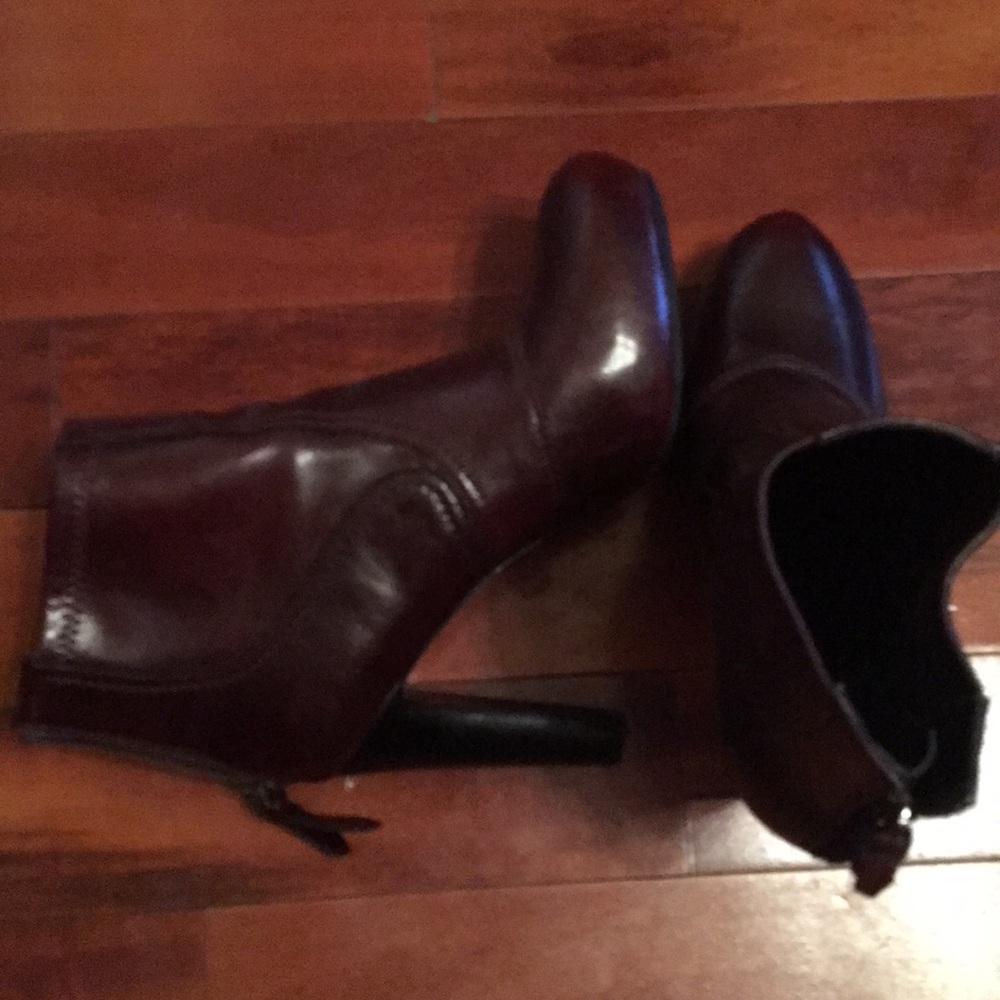 Burgundy ankle boots.